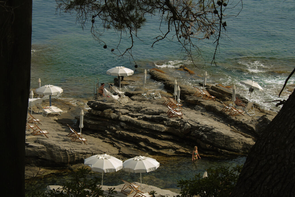 A photo of a rocky beach in Genoa, Italy