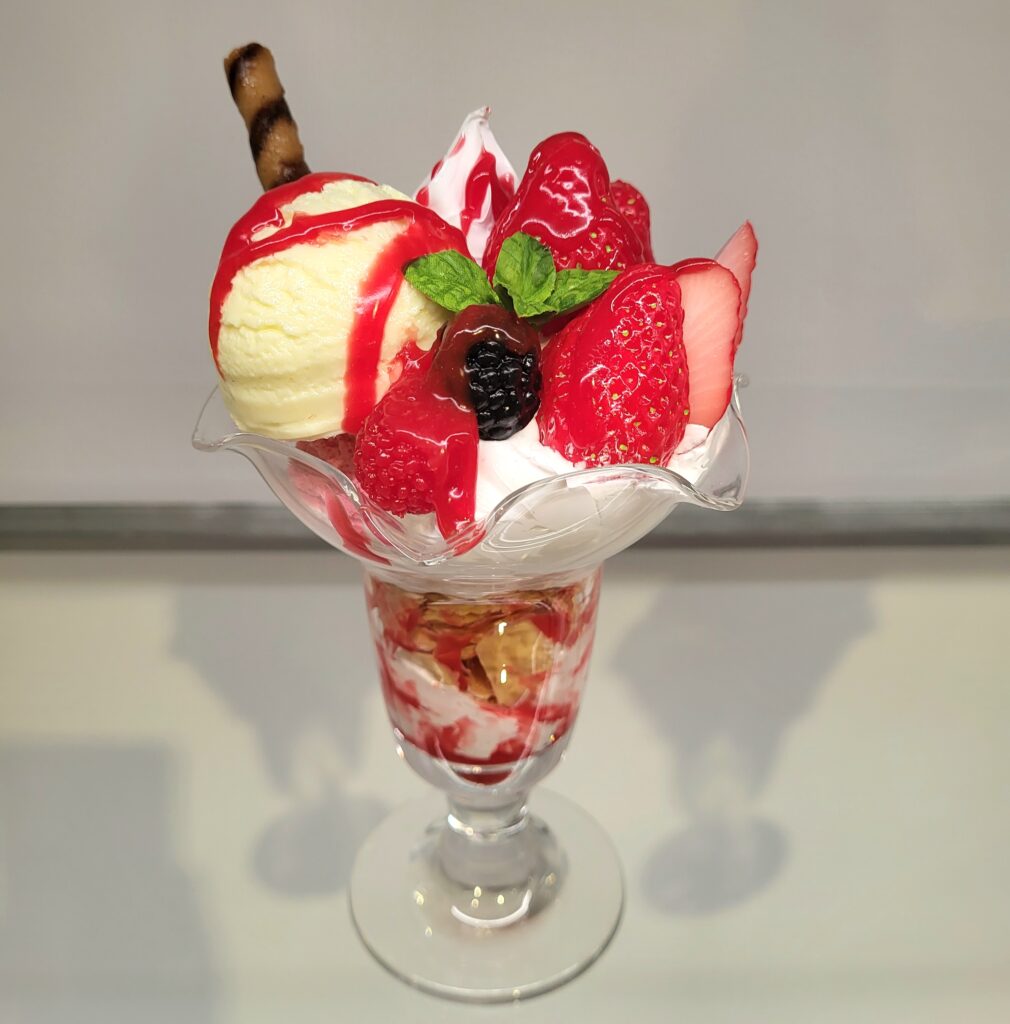 Food replica of an ice cream sundae in the 'Looks Delicious!' exhibition at Japan House