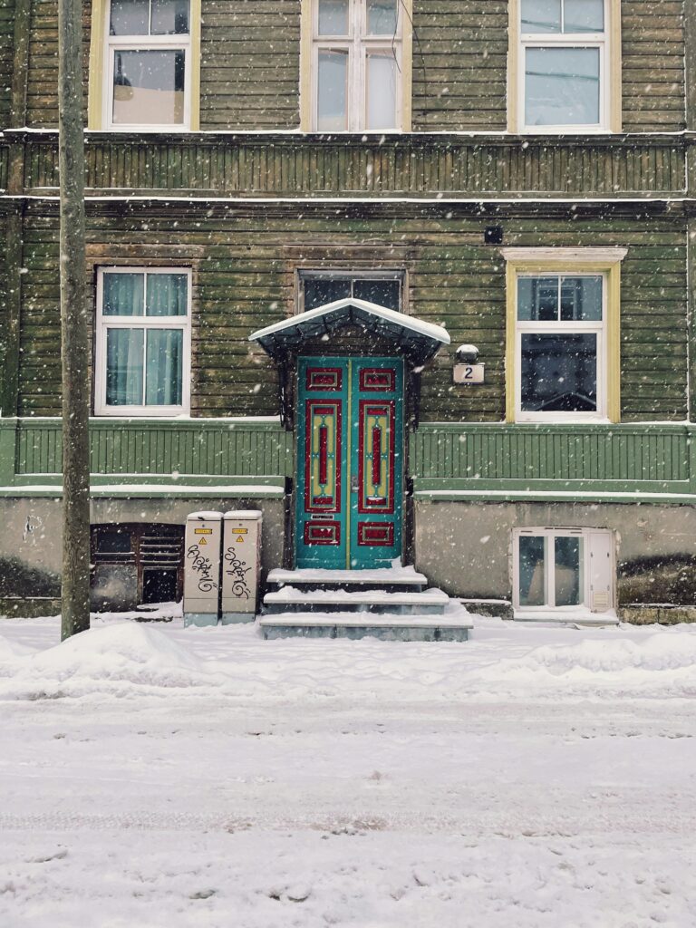 Winter pelts house in Tallinn, Estonia, with snow